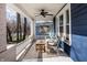 Cozy front porch with comfortable seating, creating an inviting outdoor space for relaxation at 4350 N College Ave, Indianapolis, IN 46205