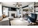Spacious living room with built-in bookshelves, a fireplace, and comfortable seating at 4350 N College Ave, Indianapolis, IN 46205