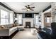 Bright living room with a fireplace, comfortable seating, and an open floor plan at 4350 N College Ave, Indianapolis, IN 46205