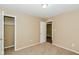 Cozy bedroom with closet and neutral walls at 5010 Elliott Ave, Indianapolis, IN 46201