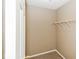 An ample walk-in closet offers shelving and room for organization at 5010 Elliott Ave, Indianapolis, IN 46201