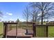 A spacious deck offers beautiful neighborhood views and outdoor enjoyment at 5233 Birmingham Dr, Indianapolis, IN 46235