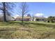 Expansive backyard offers space for recreation and relaxation with a patio area at 5233 Birmingham Dr, Indianapolis, IN 46235