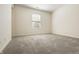 Bedroom featuring neutral carpet and a window with blinds at 5233 Birmingham Dr, Indianapolis, IN 46235