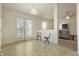 Dining area featuring tile floor and lots of natural light from sliding glass door at 5233 Birmingham Dr, Indianapolis, IN 46235