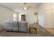 Cozy living room with neutral colors, carpeted floors, and a comfortable sofa at 5233 Birmingham Dr, Indianapolis, IN 46235