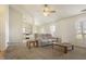 Cozy living room with a plush sofa, and open view to the kitchen area at 5233 Birmingham Dr, Indianapolis, IN 46235