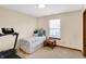 This bright bedroom features a twin bed and is ready for personalization at 5737 Misty Ridge Cir, Indianapolis, IN 46237