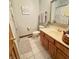 Cozy bathroom featuring a wood vanity, neutral walls, and tile flooring at 5949 Willow Bend Dr, Avon, IN 46123