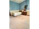 Bedroom featuring soft carpet, simple bed, traditional nightstand, and soothing light blue walls for a calm ambiance at 5949 Willow Bend Dr, Avon, IN 46123