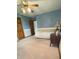 A serene bedroom with soft carpet, featuring a simple bed, a classic nightstand and light blue walls at 5949 Willow Bend Dr, Avon, IN 46123