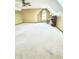A bonus room provides ample space with neutral walls and plush carpeting at 5949 Willow Bend Dr, Avon, IN 46123
