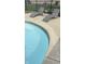 Sparkling inground pool with lounge chairs for backyard enjoyment at 5949 Willow Bend Dr, Avon, IN 46123