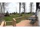 Inviting back deck features views of large yard and mature trees at 5967 Oak Hill East Dr, Plainfield, IN 46168