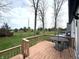 Inviting back deck features views of large yard and mature trees at 5967 Oak Hill East Dr, Plainfield, IN 46168