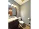Bathroom with a dark vanity, neutral walls, and neutral colored flooring at 5967 Oak Hill East Dr, Plainfield, IN 46168