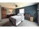 Bedroom boasts a comfortable bed, dresser, and ample natural light from the window at 5967 Oak Hill East Dr, Plainfield, IN 46168