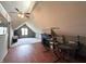 Unique bonus room with vaulted ceilings, fireplace, and hardwood flooring at 5967 Oak Hill East Dr, Plainfield, IN 46168
