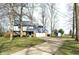 Charming two-story home with well-maintained lawn and two-car garage at 5967 Oak Hill East Dr, Plainfield, IN 46168