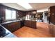 This is a kitchen featuring wood cabinets and granite countertops with stainless steel appliances at 5967 Oak Hill East Dr, Plainfield, IN 46168