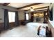 Spacious living room featuring a stone fireplace and beamed ceilings at 5967 Oak Hill East Dr, Plainfield, IN 46168