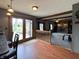 Open living space with wood flooring, and view of fireplace at 5967 Oak Hill East Dr, Plainfield, IN 46168
