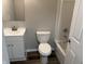 This bathroom includes a vanity with sink, toilet and shower-tub combo at 6044 Granner Dr, Indianapolis, IN 46221