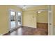Bright dining room with french doors leading to backyard and view of adjacent room at 6515 Park Central Way # B, Indianapolis, IN 46260