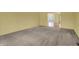 Spacious living room with carpet and view to dining area at 6515 Park Central Way # B, Indianapolis, IN 46260