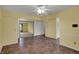 Spacious living room area featuring neutral walls, tile flooring, and an open layout at 6515 Park Central Way # B, Indianapolis, IN 46260