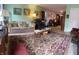Comfortable living room featuring a decorative rug, plush seating, and stylish decor at 6808 Summer Time Dr, Indianapolis, IN 46226