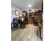 Home office space with wooden desk, chair, and shelving for organized storage at 6808 Summer Time Dr, Indianapolis, IN 46226