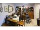 Cozy office space with wooden desk, display shelving, and an ergonomic office chair at 6808 Summer Time Dr, Indianapolis, IN 46226