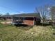 Backyard featuring a trampoline, patio, and garden, great for outdoor fun at 731 W Stop 11 Rd, Indianapolis, IN 46217