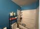 Bathroom with a tub/shower and storage rack at 731 W Stop 11 Rd, Indianapolis, IN 46217