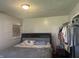 Relaxing bedroom featuring a comfortable bed and a closet for storage at 731 W Stop 11 Rd, Indianapolis, IN 46217