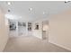 Finished basement featuring built-in shelving and a pass-through to an additional room at 7341 Campfire Run, Indianapolis, IN 46236