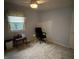 Bright bedroom with carpeted floors, ceiling fan and natural light creates a comfortable, airy ambiance at 7341 Campfire Run, Indianapolis, IN 46236