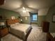 Cozy bedroom with a window seat and a neutral color scheme offers a relaxing retreat at 7341 Campfire Run, Indianapolis, IN 46236