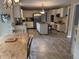 Spacious open-concept kitchen with large island, breakfast bar, and modern appliances boasts a welcoming atmosphere at 7341 Campfire Run, Indianapolis, IN 46236