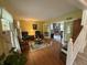 Inviting living room featuring hardwood floors, two chairs and a decorative area rug at 7341 Campfire Run, Indianapolis, IN 46236