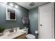 Cozy bathroom with modern fixtures, a large mirror, and fresh towels at 8336 Woodall Dr # Kr, Indianapolis, IN 46268