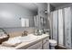 Well-lit bathroom with a neutral color palette, white sink, and decorative accents offering a serene and functional space at 8336 Woodall Dr # Kr, Indianapolis, IN 46268