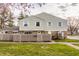 Inviting exterior of a townhome with charming fence and well-maintained lawn at 8336 Woodall Dr # Kr, Indianapolis, IN 46268