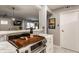 Modern kitchen with stainless steel appliances, marble countertops, and open layout to the living area at 8336 Woodall Dr # Kr, Indianapolis, IN 46268