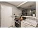 Charming kitchen features stainless steel appliances, marble countertops, and decorative backsplash at 8336 Woodall Dr # Kr, Indianapolis, IN 46268