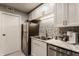 Bright kitchen featuring stainless steel appliances, white cabinets and decorative backsplash at 8336 Woodall Dr # Kr, Indianapolis, IN 46268