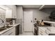 Well-designed kitchen featuring stainless steel appliances, marble countertops, and decorative backsplash at 8336 Woodall Dr # Kr, Indianapolis, IN 46268