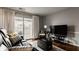 Relaxing living area with natural light and sliding doors to outdoor space at 8336 Woodall Dr # Kr, Indianapolis, IN 46268