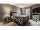 Serene bedroom with a comfortable bed, soft lighting, and a view of the outdoors at 8336 Woodall Dr # Kr, Indianapolis, IN 46268